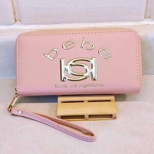 BEBE LOS ANGELES LIGHT PINK WRISTLET WALLET CARD HOLDER CASH HOLDER